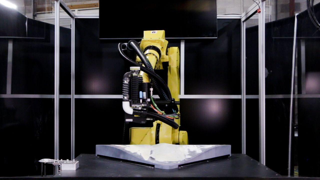 A robot scans an aerospace component using a scanner and QC Plus software, by Manufacturing Automation Systems, which creates and adapt custom paths to sand.