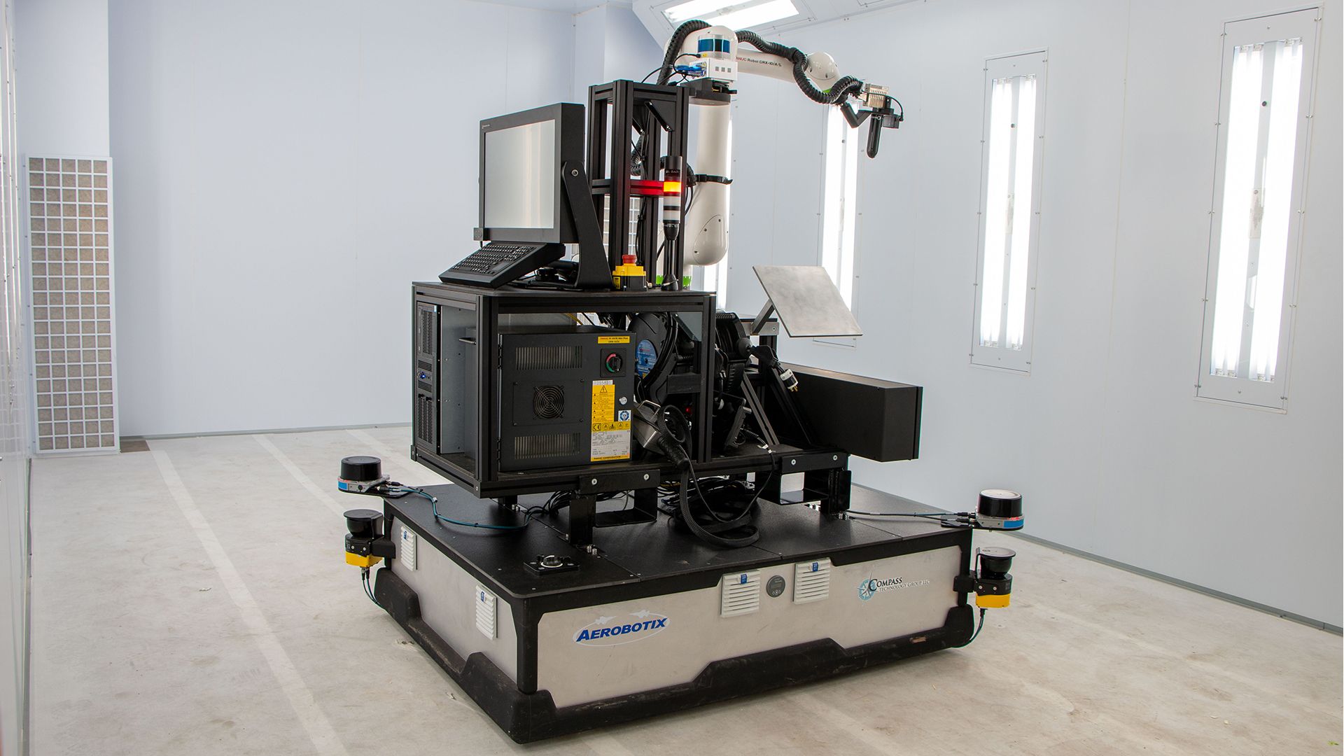 Aerobotix’s automated guided vehicle (or mobile robot), along with the Advanced Microwave Mapping Probe, developed by Compass Technology Group.