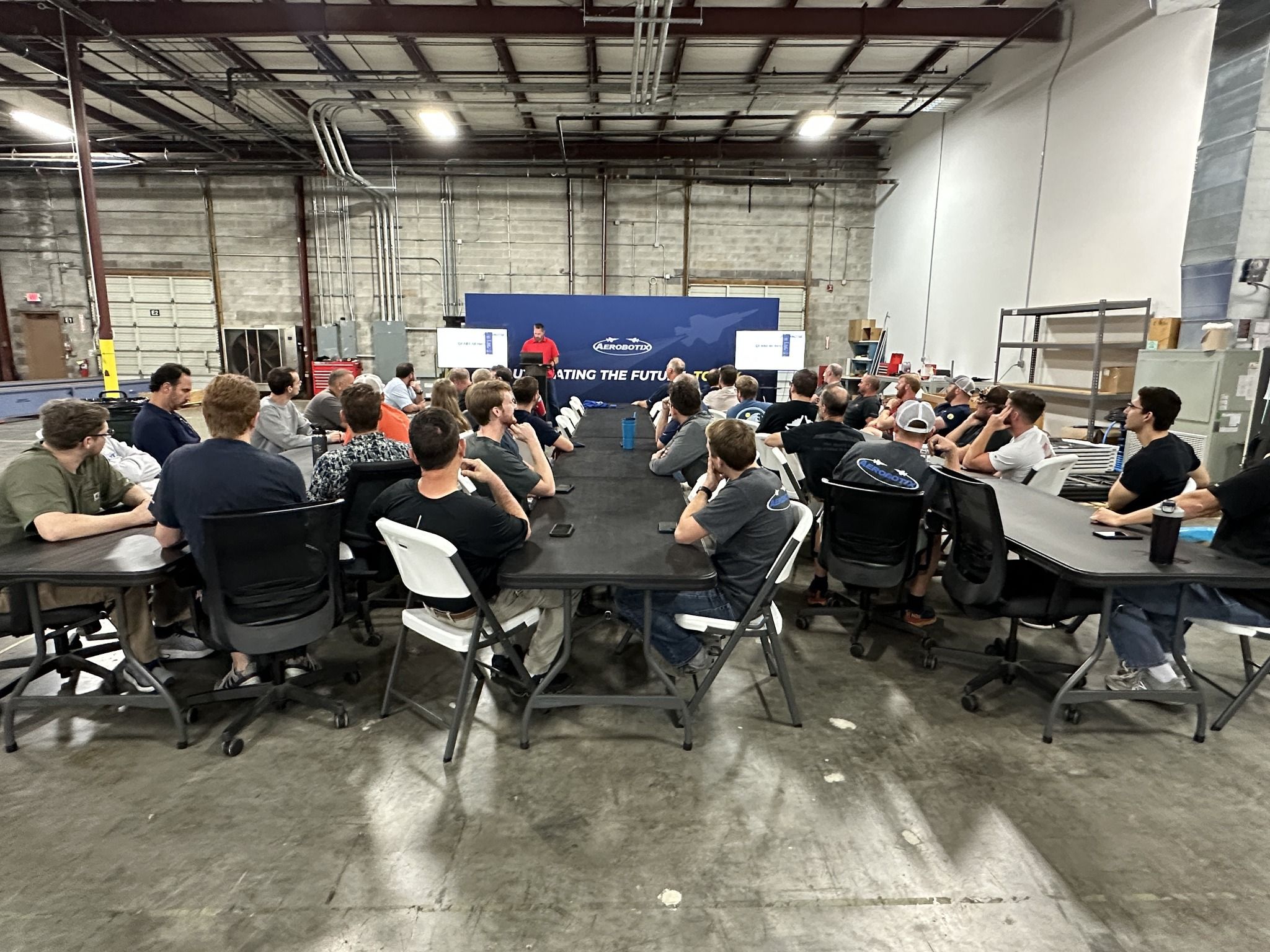Aerobotix holds a quarterly company meeting to update the team of the current state.