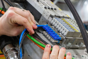 A group of connectors being inspected.